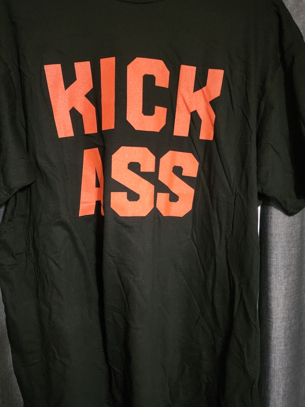 Sony Black Short Sleeve Tee with Orange 'KICK ASS' Graphic
